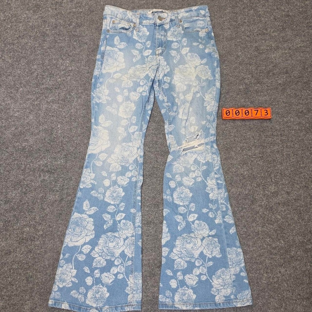 Celebrity Pink white floral flare jeans with white rose print on blue denim, 5